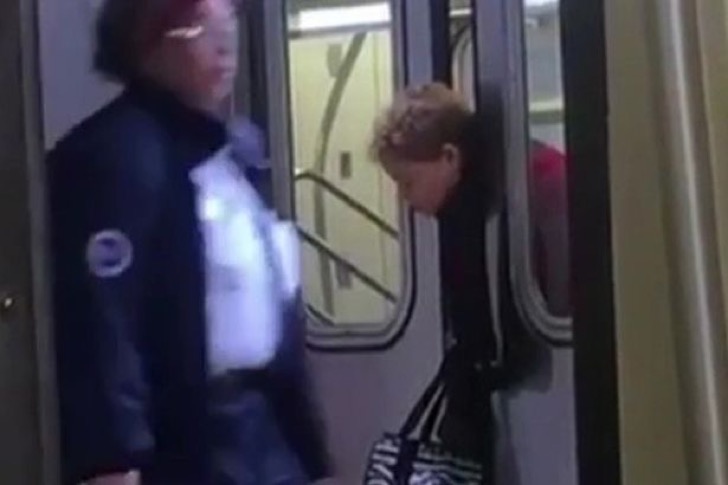 Shocking moment woman gets HEAD trapped in closing train doors at station but passengers simply 1 2