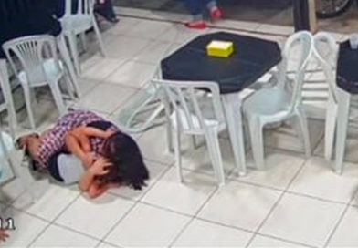 Una mujer embarazada se lanzó sobre su hijo para protegerlo, cuando un hombre armado entró el pasado domingo en una hamburguesería de la localidad de Recanto das Emas, en el Distrito Federal de Brasil, y abrió fuego.