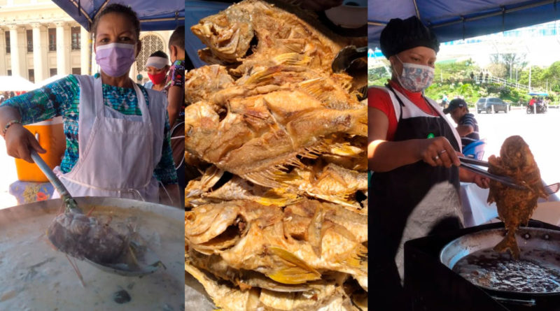 Vendedores de mariscos ofreciendo sus productos en la plaza 22 de Agosto de Managua