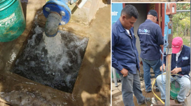 Trabajadores de ENACAL durante el restablecimiento de agua potable en la comunidad La Jarquina