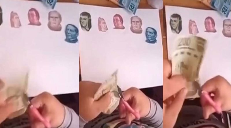 Niña recorta los rostros de varios billetes para su tarea.