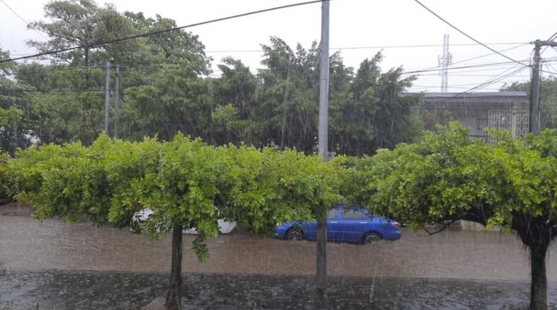 Imagen de una de las calles de Managua mientras llueve