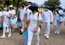 Brigadistas del Ministerio de Salud en el barrio Villa La Concha en la zona 8 de Ciudad Sandino, Managua.