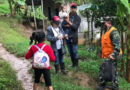 Efectivo Militar del Ejército de Nicaragua evacuando a familia del barrio 30 de Mayo en San Carlos, Río San Juan